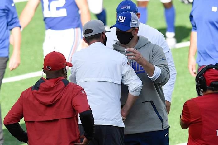 New York Giants head coach Joe Judge and San Francisco 49ers head coach Kyle Shanahan hug after the game. The New York Giants lose to the San Francisco 49ers, 36-9, in an NFL game at MetLife Stadium on Sunday, Sept. 27, 2020, in East Rutherford. Giants 49ers
